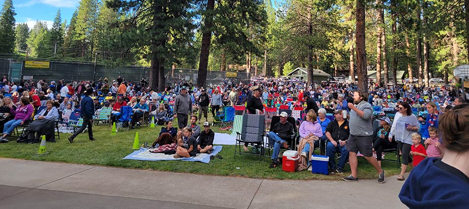 Community gathered around enjoying the Lake Almanor Summer Concert Series.